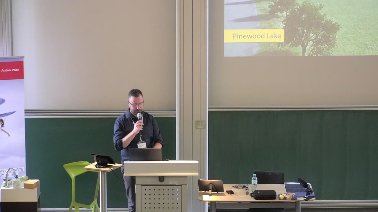 Talk on stage at Game Dev Days Graz 2023, from the TUbe recording