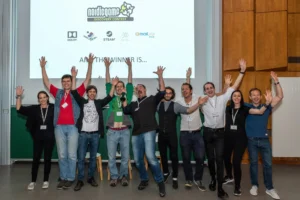 Nordic Game Discovery Contest participants cheering on stage at Game Dev Days Graz 2018
