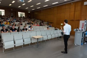 A speaker in front of the audience at Game Dev Days Graz 2018
