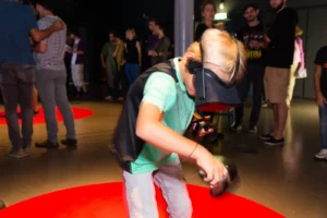 An attendee trying a VR game at Game Dev Days Graz 2017
